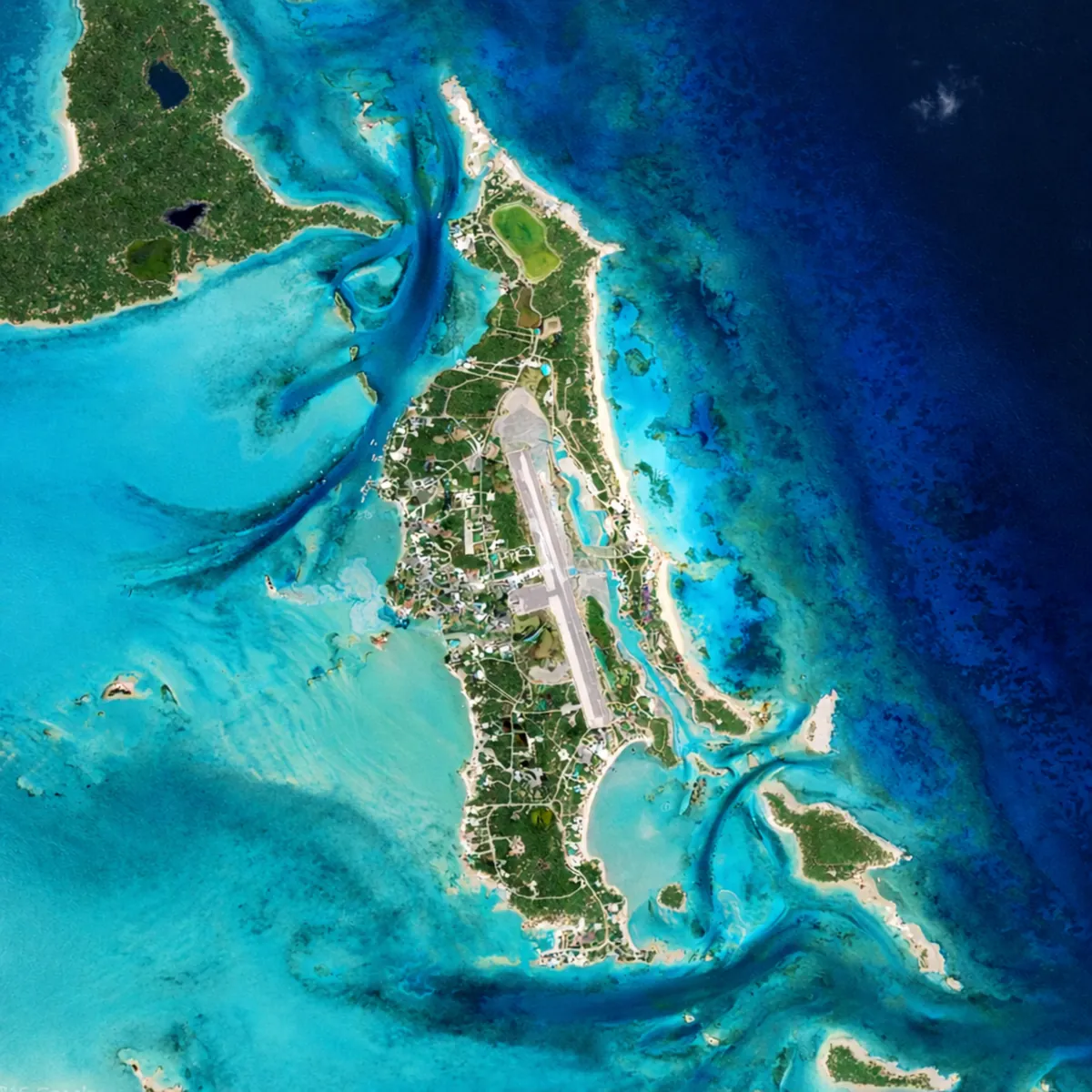 Satellite view of Staniel Cay in the Exumas, Bahamas, showing Staniel Cay Airport (MYES) and surrounding islands served by private charter flight with Bahamas Charter Flights Since 1987