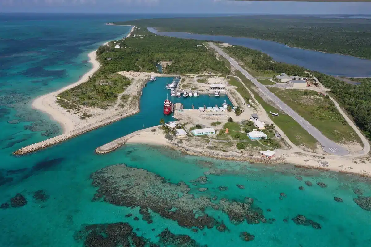 Aerial view near Pitts Town Point Airport (MYCP / PWN) on Crooked Island Bahamas with marina and shoreline