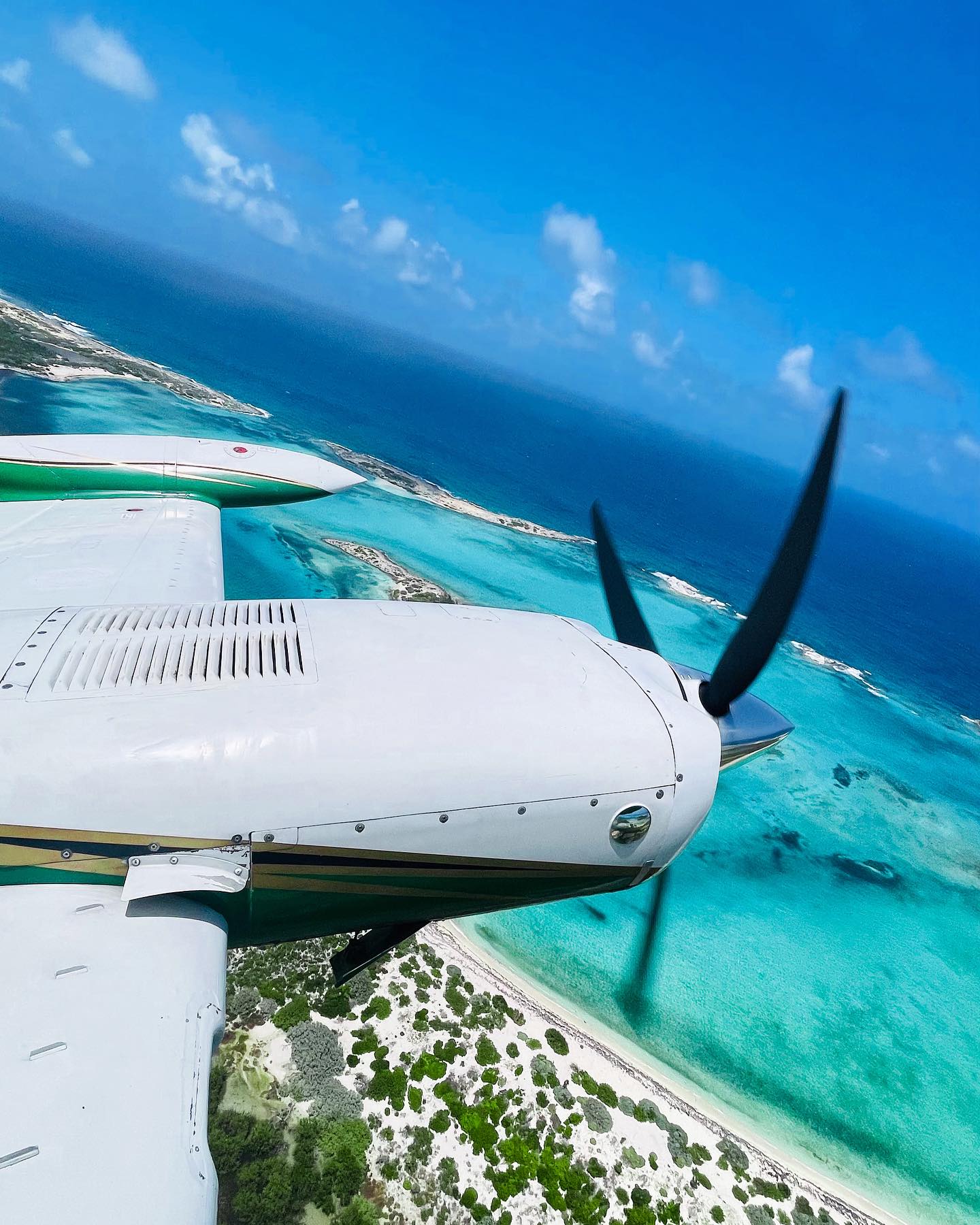 Private charter flight arriving over Cat Island, Bahamas serving New Bight (MYCB), Arthur’s Town (MYCA), and Hawk’s Nest Airport (MYCH)